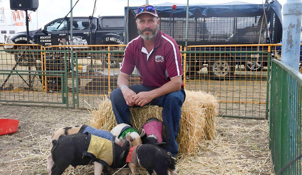 Rob McGowan has travelled from Cairns to Hobart with the team of racing pigs. Pictures: Clare Adcock