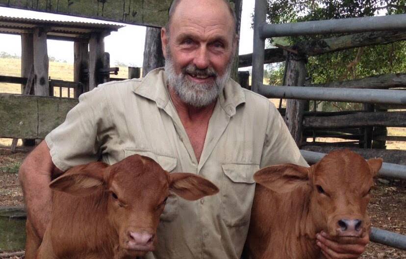 Laurie Ellis with twin calves he raised at the Yerra property. Picture: Supplied Ken Ellis