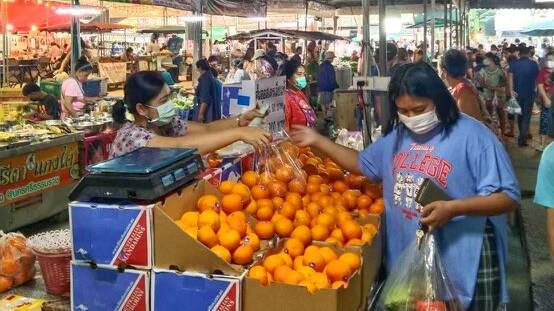 Matt and Rachael Benham find their fruit in Thai street markets. Picture: Rachel Benham
