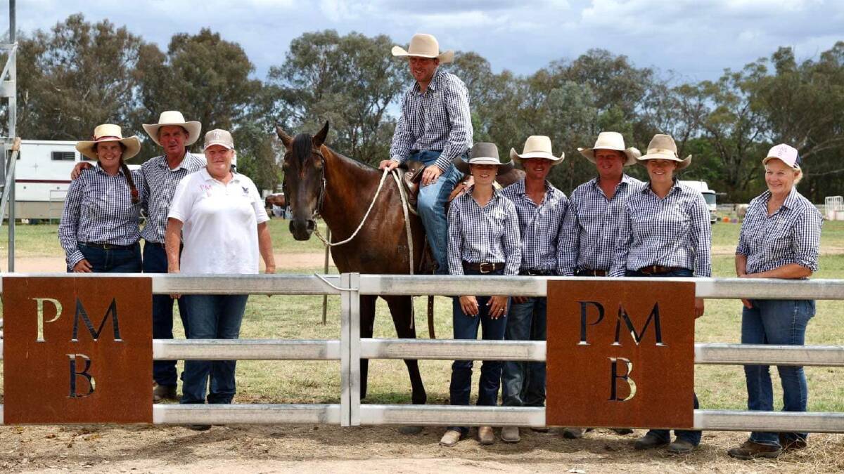 Berragoon Stash who sold for $80,000 to the Will Durkin Syndicate, Charters Towers, Qld, with Maxyne Prothero, Charlie and Sara Grills, Jim Grills, Katie Wells, Marty and Darcy O'Sullivan, Lucy Grylls and Debbie Grylls, all of Berragoon Stock Horse stud. Photo supplied. 