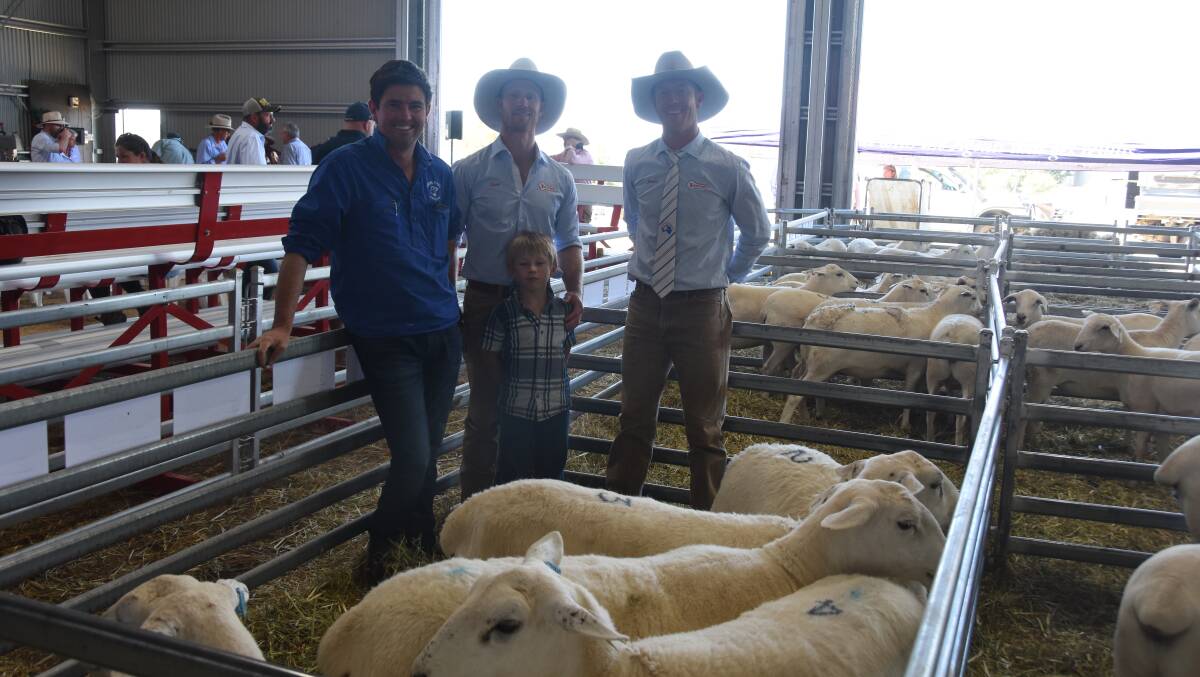 Volume buyer Corey Irvin, Cooee Park Agriculture, Barrellan with Ross, Lawson, 6 and James Gilmore, Tattykeel Australian Whites. Photo by Helen De Costa. 