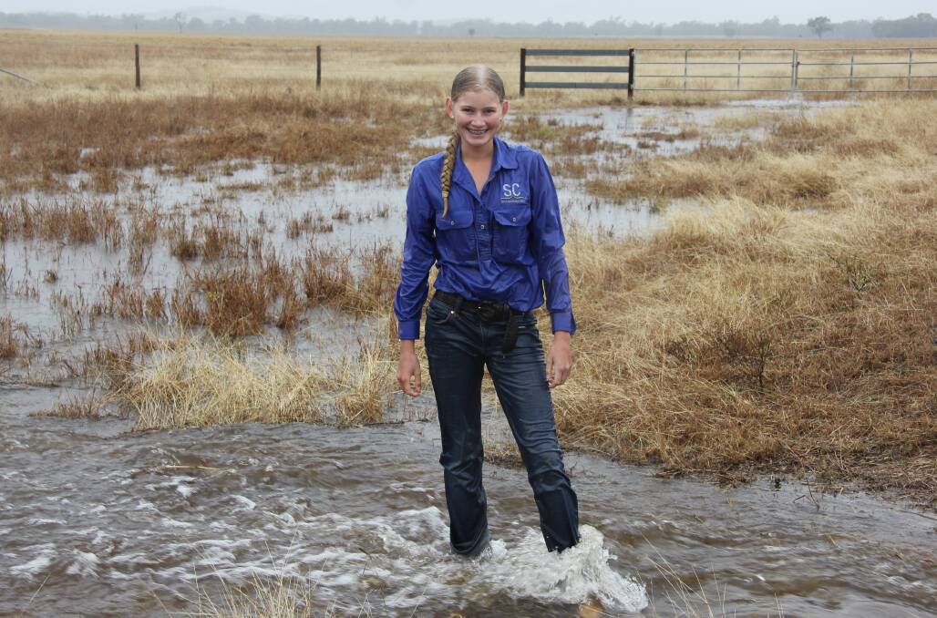 Lara Farmer, Mt Elsa, Canoona, was loving the rain. Picture: Claire Farmer