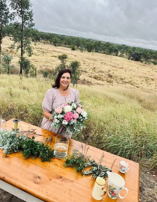 Jolene Priddle at work with flowers at Avoca, near Alpha. Picture: Emily Watterson