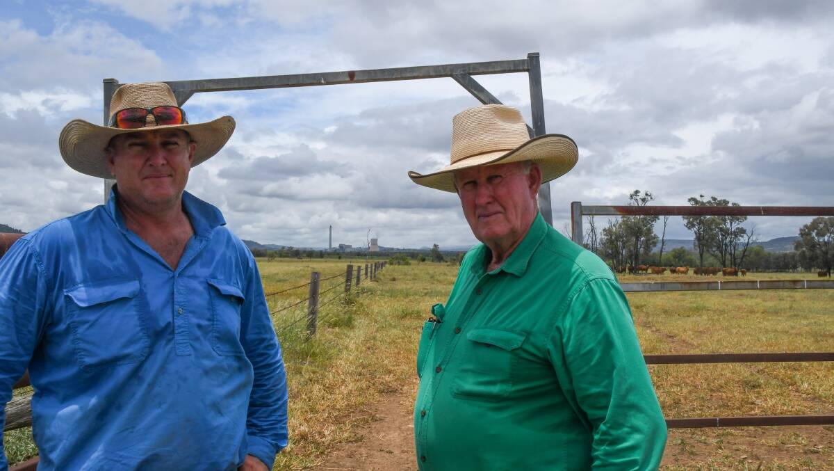 Larry Acton, with his son, Richard, on his Biloela property where the bore water is contaminated with PFAS from the nearby Callide power station. Picture: Judith Maizey
