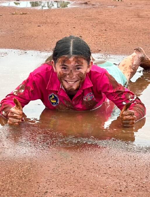 Home from boarding school, Emma Lamont, Hyde Park Station, south west of Charters Towers, had a play in the mud today after all the rain. Picture: Rebecca Lamont 