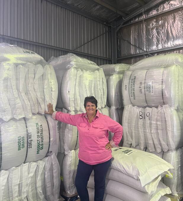 North Queensland Tropical Seeds director Maryann Salvatti with some grass seeds ready to ship, said suppliers had to be six months ahead of demand to be able to supply grass varieties to meet changing landholder needs. Picture: Supplied 