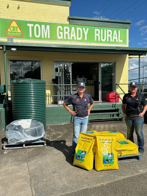 Barry McIntyre and Kelly Semple outside Tom Grady Rural Supplies in Gympie said there's been a lot of interest in mixed grass varieties to combat pasture dieback. Picture: Supplied