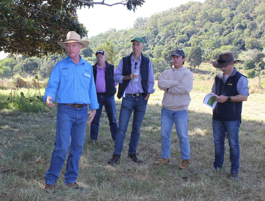 Department of Agriculture pasture agronomist Ted Callanan showing some attendees of the Boonah field day on May 21 the results of a four year trial which assessed the tolerance of mealybugs to 29 grass varities. Picture: Supplied