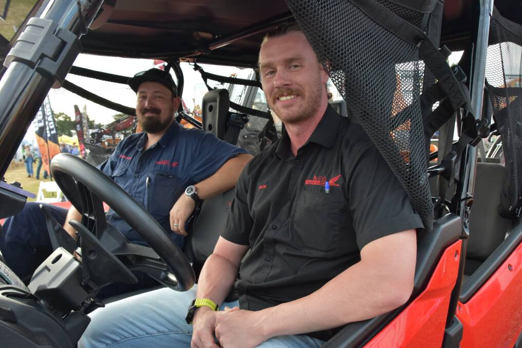 Michael Morgan and Jack O'Day from Morgan Motors in one of their company's side by sides. Picture: Steph Allen
