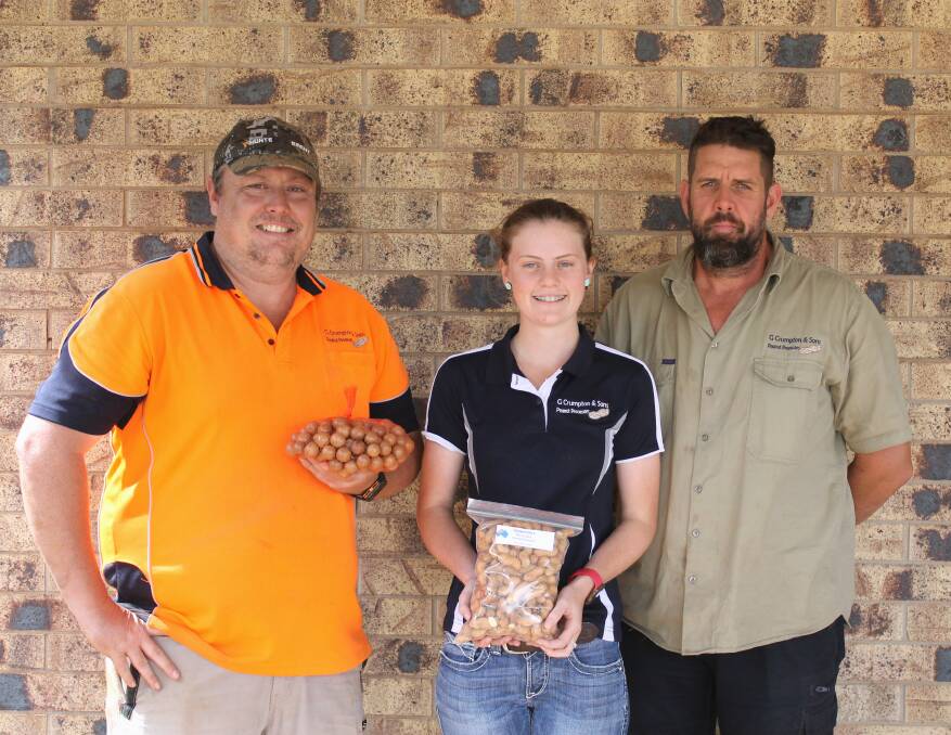 General manager Daniel Cook, Administration officer, Rhianon Braithwaite, and Crumptons CEO, Sonie Crumpton, with some of the macadamias and peanuts. Picture by Kelly Mason