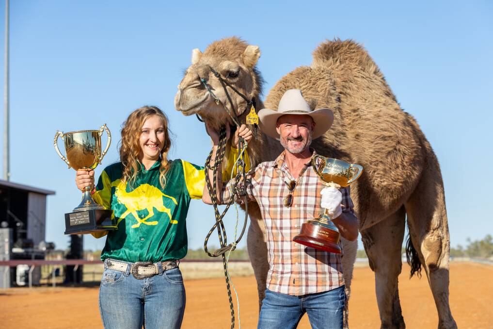 Local Boulia jockey Kyrraley Woodhouse with Better Beer Cup and jockey Glen Boss with Lexus Melbourne Cup. Picture by Matt Williams Photography