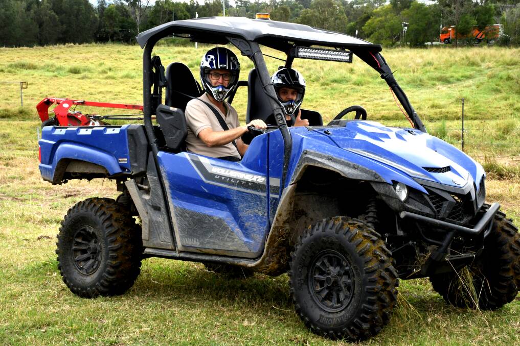 Ag prgram coordiantor Chris Butcher teaching ag student Josh Chavell how to use the ATV. Picture: Kelly Mason