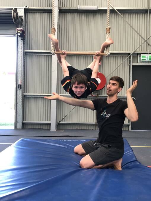 St Joseph's Blackall student Matia Kelly and circus instructor Alex Wecks-Hughes showing how much enjoyment rural students get from arts-related activities.