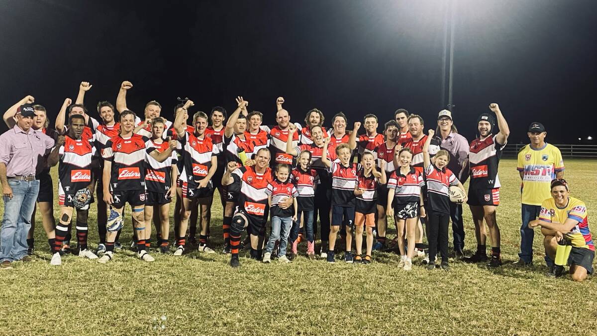 Alpha Brumbies team mates, management and ball boys and girls celebrate after their home win in honour of Hayden Johnson. Picture: Kayli O'Toole