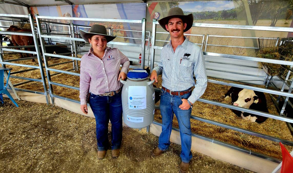 Georgia Graham and Mac Kenny with the tank of semen straws ready to auction. Picture: Sally Gall