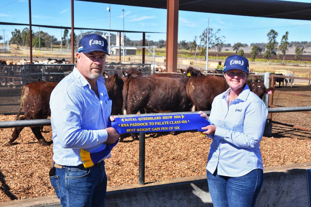 Sean Sturges, JBS Beef City feedlot manager with Megan Crowley, JBS Beef City's livestock supervisor, with The Grove Shorthorn's winning pen. Picture: Ben Harden 