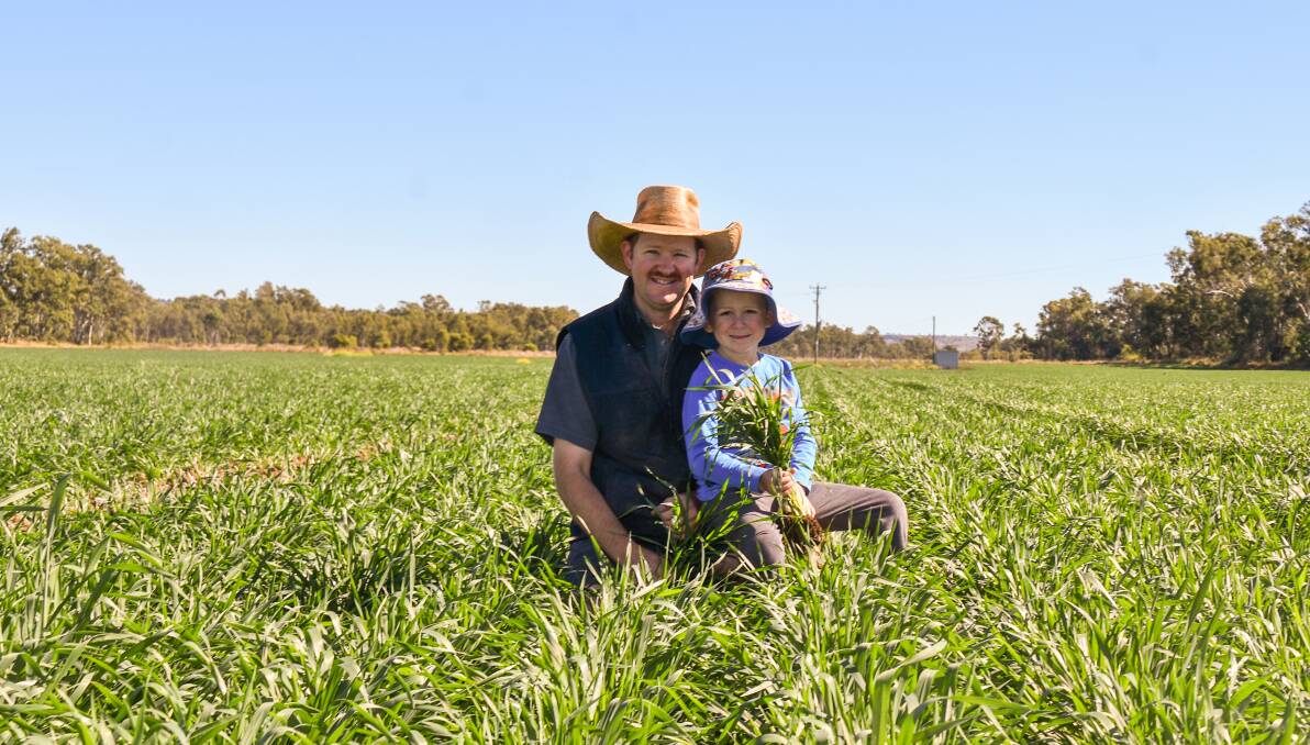 Grower Scott Muller and son Lane, Karinga, Biloela district, where they have planted wheat. 