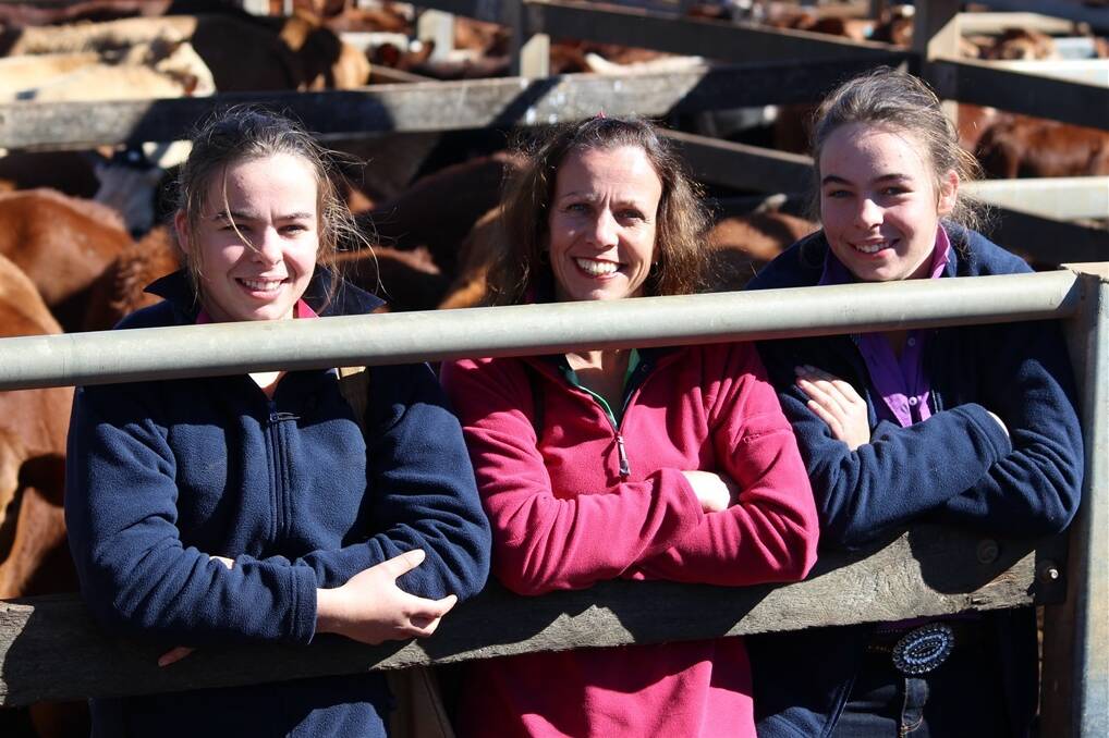 Tasmania beef producers Taylah, Linda and Katelyn Bott attended the Roma store sale on Tuesday while holidaying around Queensland. The trio were fascinated by the spectacle at Roma even though it was, by comparison to recent yardings of 11,000 head, a small store sale of just 5800 cattle. - Picture: PENELOPE ARTHUR.