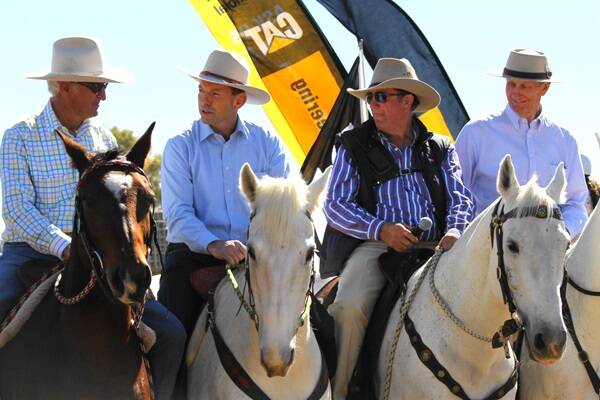 Federal Opposition Leader Tony Abbott (second left) got to hear plenty about bush issues, including wild dogs, when he visited Longreach at the weekend and joined in the grand parade at the Australian Stockmans Hall of Fame inaugural Outback Horse and Heritage Expo with Peter Hughes, Graeme Acton and Member for Maranoa Bruce Scott.