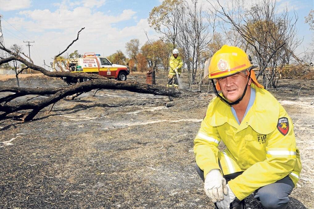 Queensland Fire and Rescue Service station officer, Clive Weeks, Emerald, and senior firefighter, Mick Gagnepain, Emerald, blacking out on the outskirts of Emerald. Picture: SARAH COULTON.