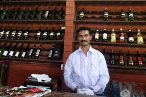 Chateau Indage restaurant manager Jitendra Gadhave ready to serve drinks at his wine bar.