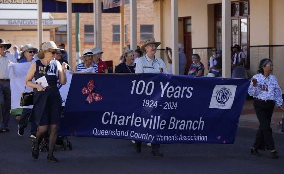 Proud Charleville QCWA members join in the Anzac march. Picture supplied. 