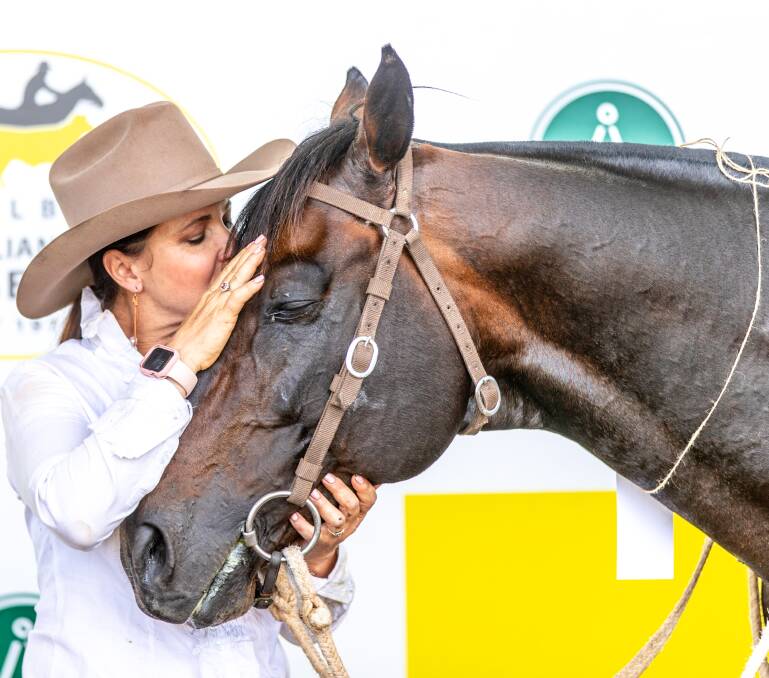 Gennie-Ann Woodall of St George says goodbye to Royalle Double Your Money at the Dalby Australian Stock Horse sale on the weekend. Picture: Penwood Creations 