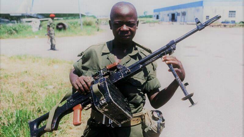 Rebel child soldier during the Congo war.