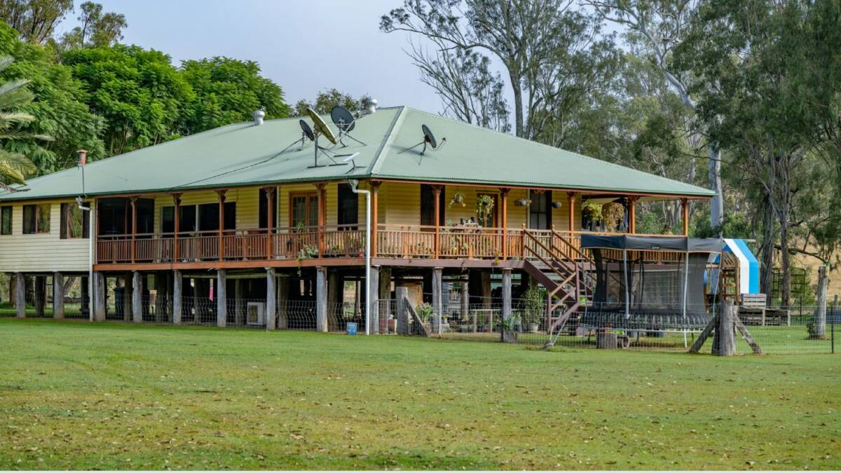 The high-set four bedroom, two bathroom Queenslander homestead has a wrap-around verandah. Picture supplied