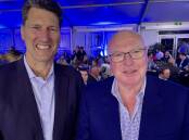 Guest speaker at the Teys dinner at Beef was former Wallaby player John Eales with the host of the evening, Brad Teys. Picture: Judith Maizey