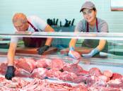 Fresh veal loin on sale in a European butchery. Photo via Shutterstock.