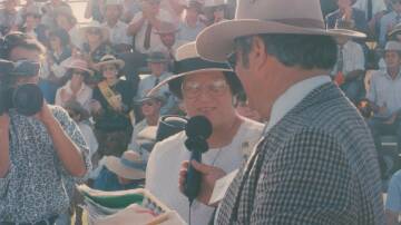 Maureen Olive being interviewed by announcer Angus Lane after the Beef 1991 interbreed bull win. Picture: Supplied